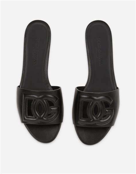 Calfskin sliders with DG Millennials logo .